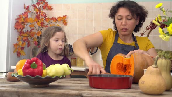 Mother and Daughter Cook Pumpkin Meals at Home
