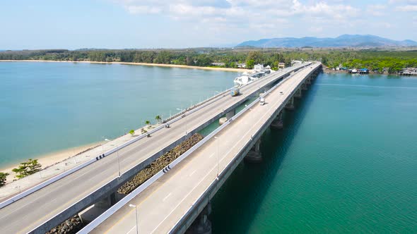 Aerial view top down view Sarasin Bridge transport over sea. Transport concept Phuket Thailand