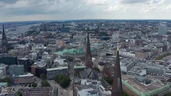 Aerial View of Historic City Centre with Tall Towers of City Hall and Churches