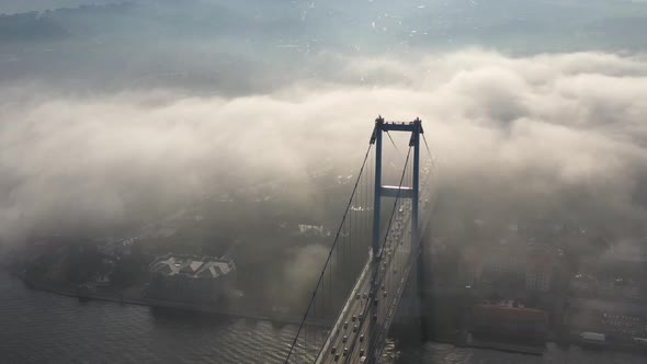 aerial video of bosphorus Bridge on a foggy day in Istanbul, Turkey, Martyrs Bridge