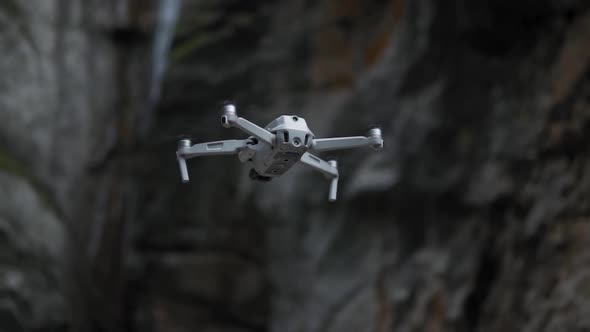Quadcopter Drone Hovering and Flying Forward, Slow Motion.