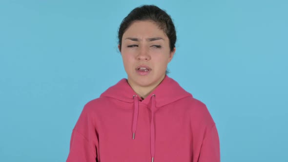 Sleepy Indian Girl Yawning Blue Background