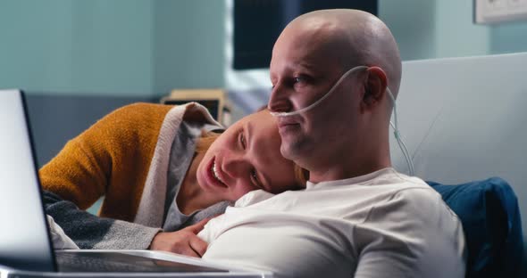 Man and Woman Making Video Call From Oncology Hospital