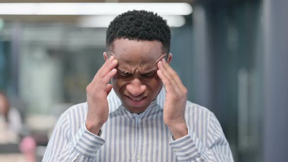 Young African Businessman Having Headache