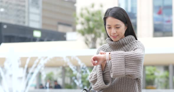 Woman using smart watch