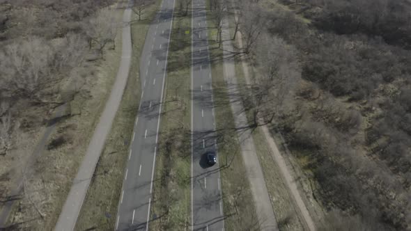 A aerial view of a Jaguar f-type driving off road, Netherlands.