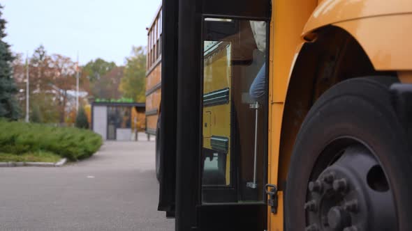 Joyful Diverse Pupils Running Out of School Bus