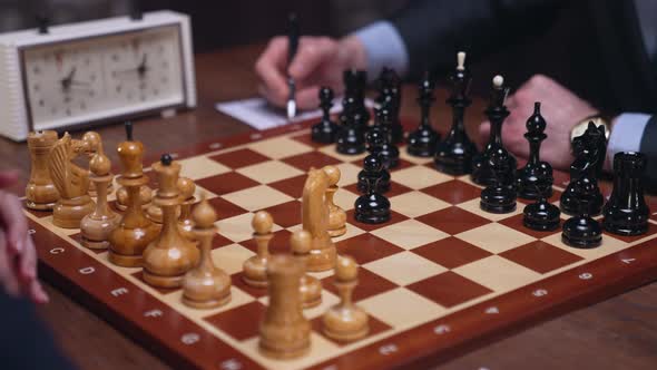Man And Girl Play Chess