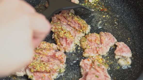 Chef stir fry minced meat in a Frying pan. Frying minced meat in a pan