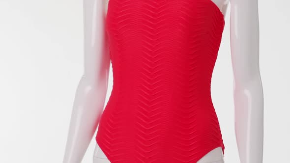 Bright Red Swimsuit on Mannequin.