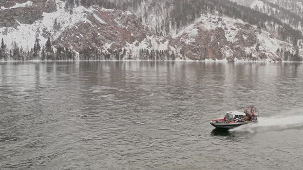 The Airboat Floats on the River