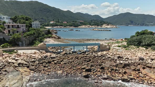 4K Aerial Drone view of Blue lover bridge in Shek O