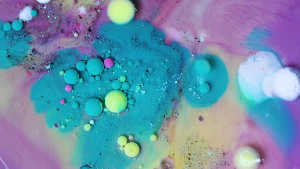 Abstract Acrylic Paint Spread Blast Explode Galaxy. Bright colored bubbles sparkling.