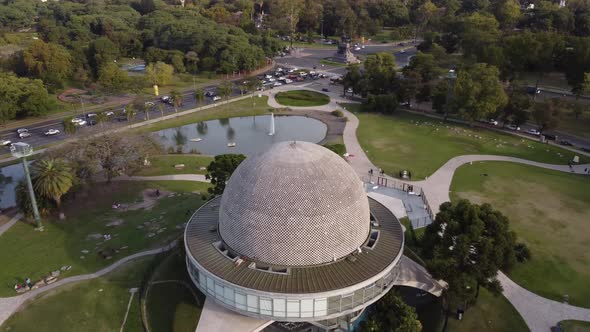 Aerial orbiting around dome of Galileo Galilei planetary in Tres de Febrero Park, Buenos Aires. Arge