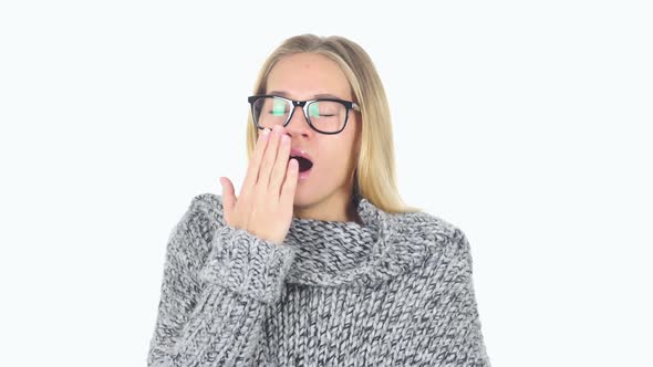 Tired Young Woman Yawning at Work White Background