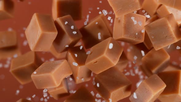 Super Slow Motion Detail Shot of Salted Caramel Explosion Towards Camera at 1000Fps