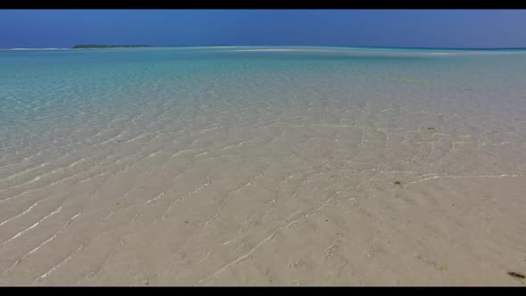 Aerial top view texture of tranquil sea view beach adventure by turquoise lagoon with bright sandy b