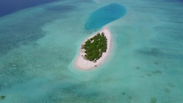 Aerial abstract of marine shore beach break by clear ocean with sand background