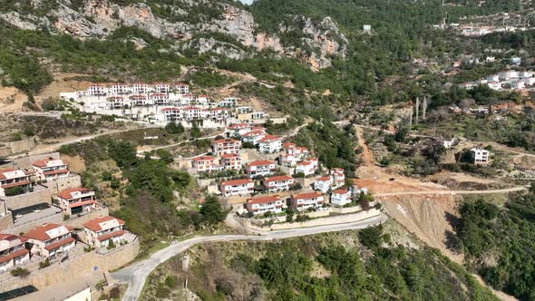 Complex of villas in the mountains aerial view 4 K