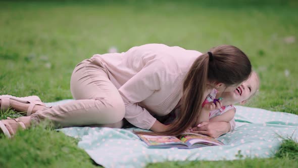 Family In Nature. Mother And Daughter Having Fun At Park