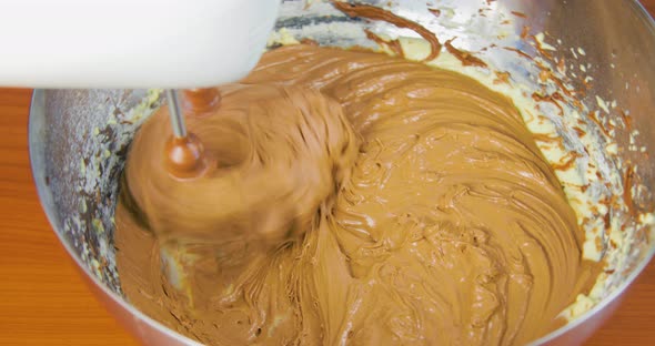 Making a cake with a Whisk