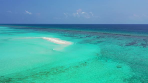 Aerial texture of relaxing coastline beach adventure by blue water with white sand background of a d