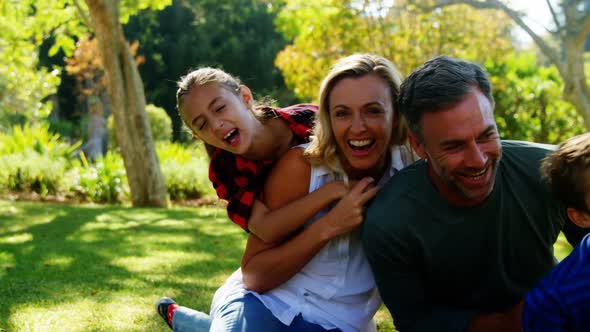 Happy family having fun in park 4k