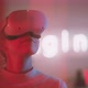 Young woman wearing vr goggles looking around with neon sign in the back - VideoHive Item for Sale