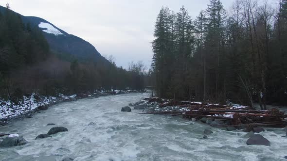 Aerial View of Chilliwack River with Snow During Winter Season