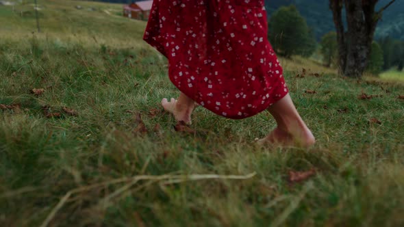 Bare Woman Feet Walking on Green Grass Close Up