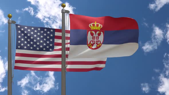 Usa Flag Vs Serbia Flag On Flagpole