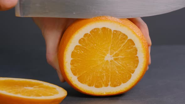 Cutting Fresh Orange Fruit