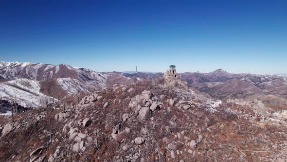 Very close up drone shot of Monjeau Peak in New Mexico on a sunny day