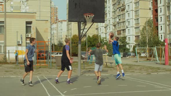 Streetball Player Scoring Field Goal with Layup Shot