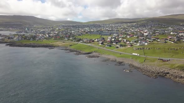 Faroe Islands Shoreline Town Panorama Filmed By Drone