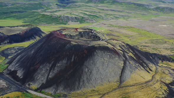 Aerial Drone Circle Flight Above Grabrok Crater Iceland