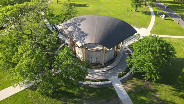 Birds eye view of covered structure in park in La Crosse, Wisconsin. Sun creating shadows.