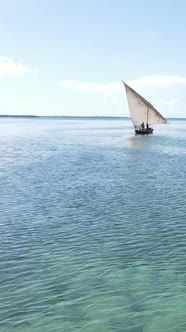 Vertical Video Boats in the Ocean Near the Coast of Zanzibar Tanzania