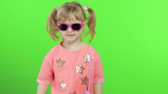 Positive Girl in Pink Blouse and Sunglasses Dancing and Posing. Chroma Key