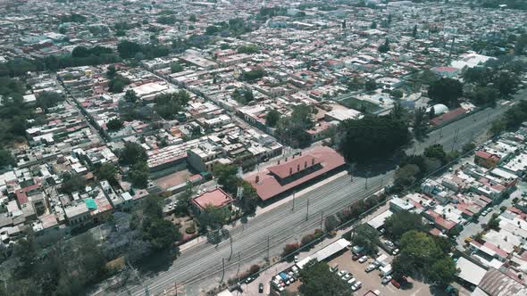 Aerial frontal view of Queretaro train station and rails in front