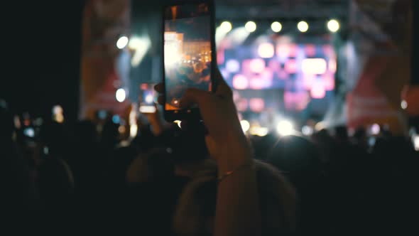 People at Music Concert Recording Video on Smartphones