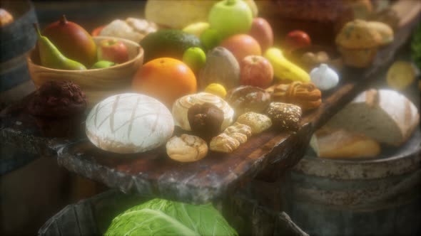 Food Table with Wine Barrels and Some Fruits Vegetables and Bread alt