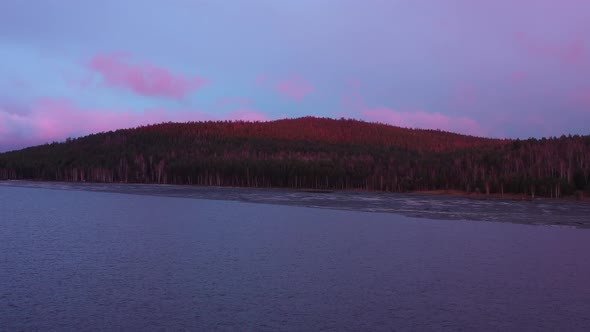 Aerial View of the Natural Landscape Sunset of the Bright Sun Over the Mountains