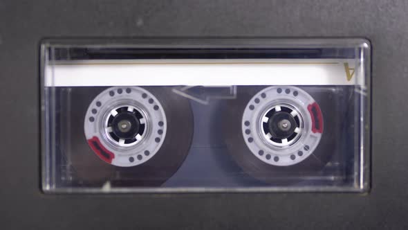 Audio Tape. Vintage Tape Recorder Plays Audio Cassette Inserted Therein