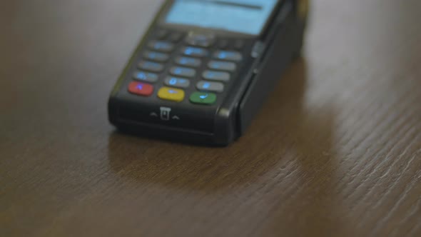 Closeup Shot of Customer Pay Over the Wireless Tradings Card-reader