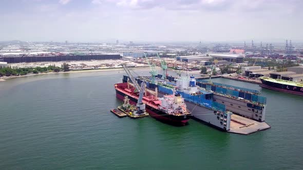 Aerial View of Logistics Concept a Cargo Ship Being Retrofit