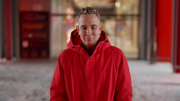 Portrait of a Confident Young Man in Fashionable Warm Clothes