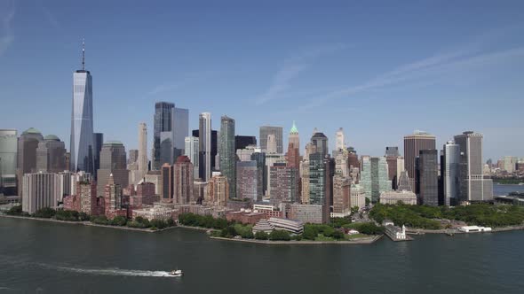 Aerial view overlooking the Battery park city, Manhattan from Hudson river, New York, USA - rising,