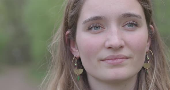 Front Close Up of Caucasian Woman Beautiful Young Human Face with Pale White Skin and Brown Hair