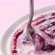Yogurt with berry jam in spoon, blueberry whipped cream - VideoHive Item for Sale